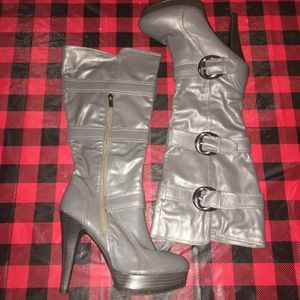 Gray mid calf buckle up boots with 5 inch heel